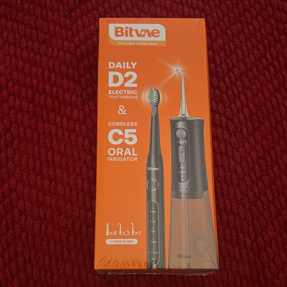 Black Electric Toothbrush and Oral Irrigator Set  (New)